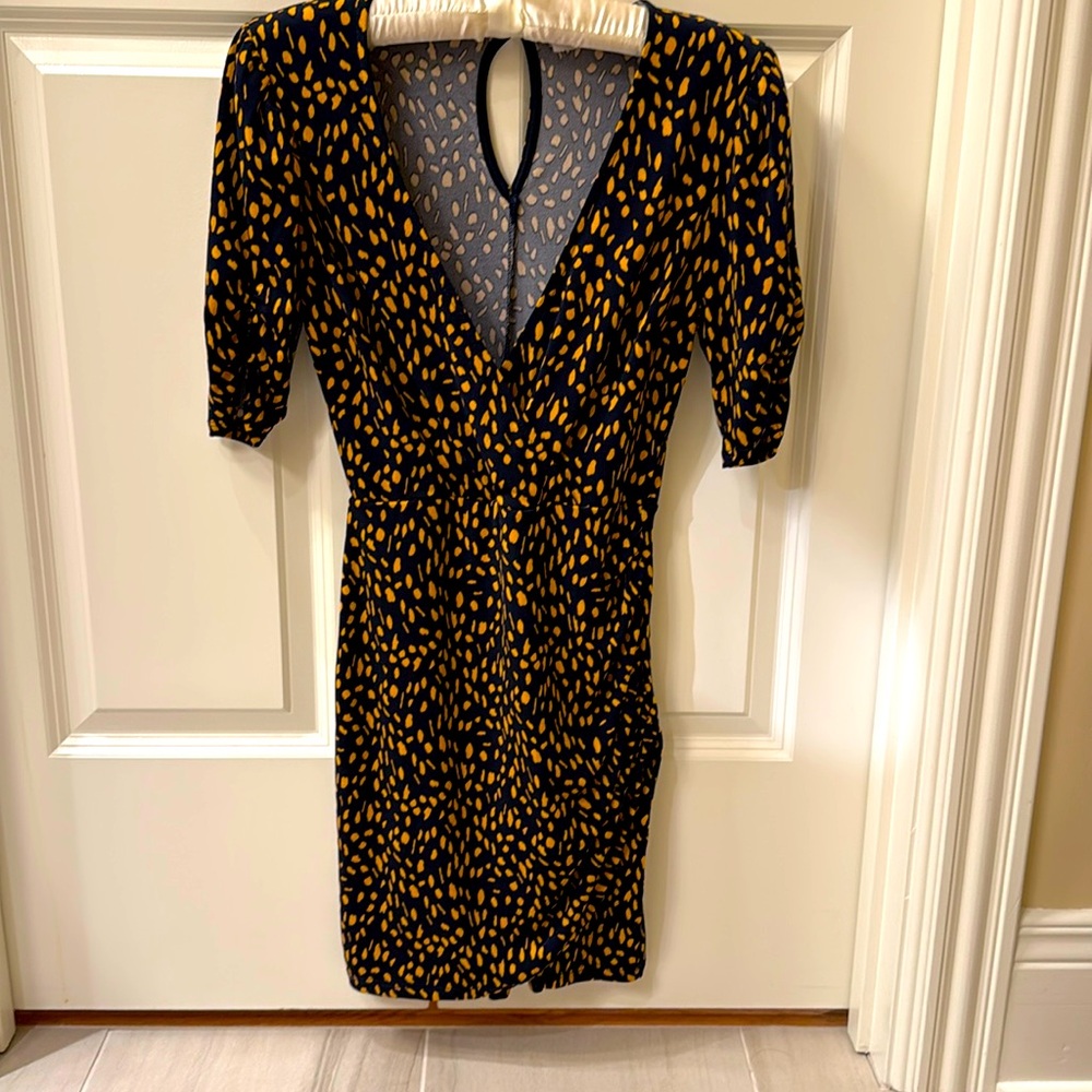 All In Favor brand stylish, wrap dress with side gathered skirt. Worn twice!!